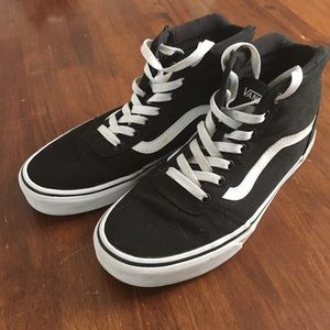 Black and white high top vans